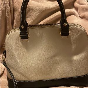 Black and cream colored Kate Spade bag only used twice. No scratches or scuffs.
